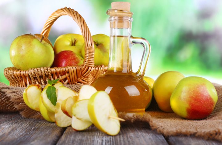 photo of apples and apple cider vinegar in a bottle